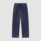 Navy blue pants with a drawstring on a white background