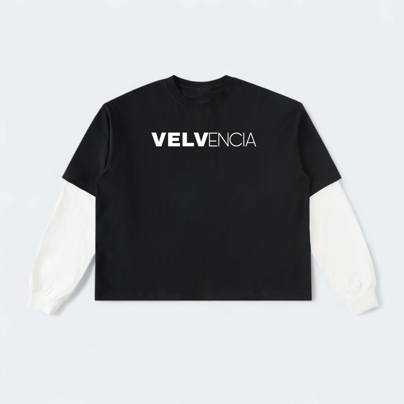 Black t-shirt with 'VELVENCIA' logo on a light gray background