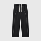 Black pants with white accents on a white background