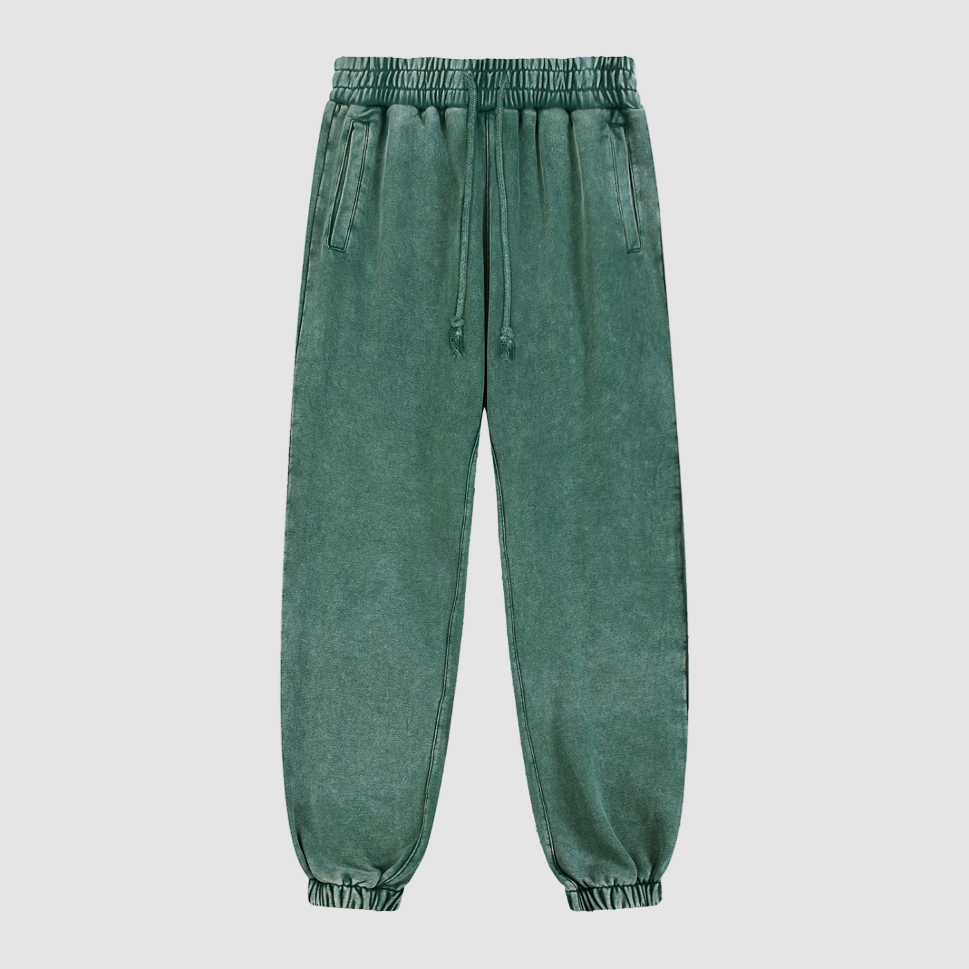 Green sweatpants on a white background